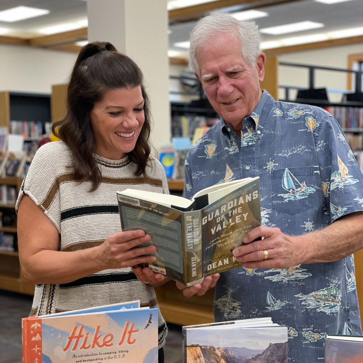 People looking at book